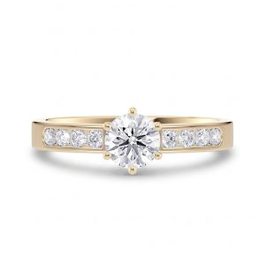 Diamantring med kanalinnfatning 0,74 ct